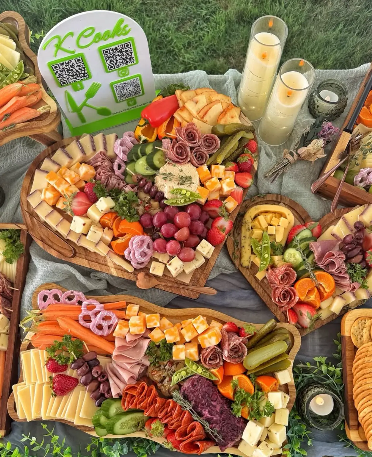 K Cooks charcuterie boards with cheeses, meats, and fruit