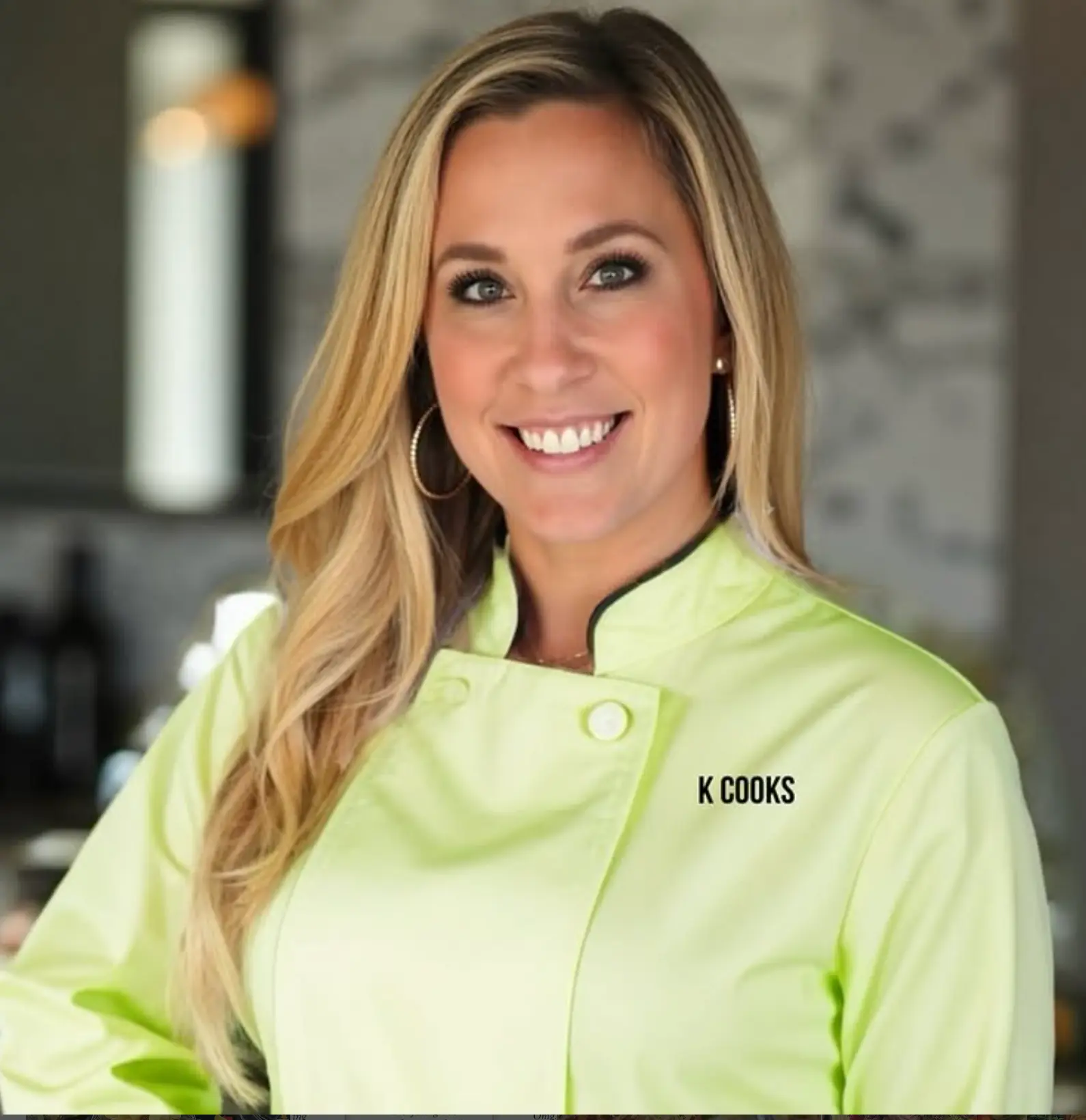 Chef Kristen Precourt in her lime-green K Cooks chef coat